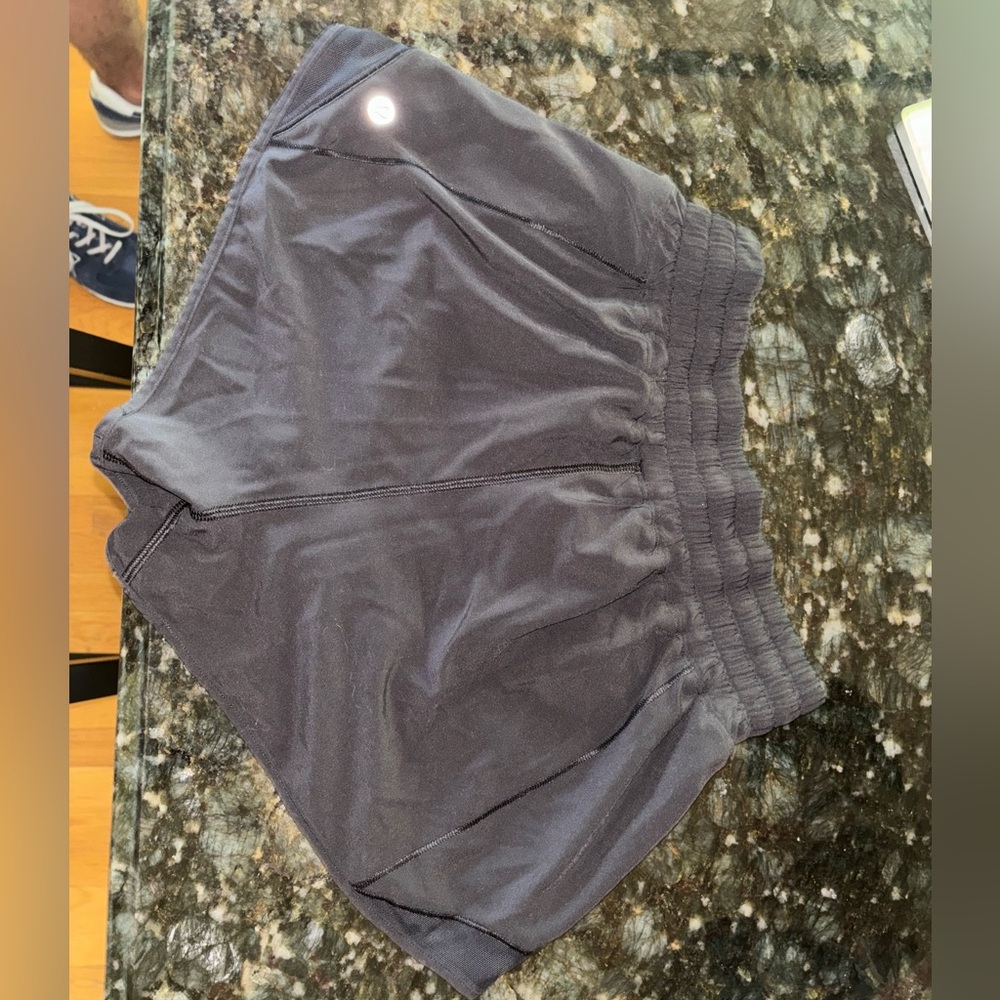 Black “hottie hot” Lululemon athletic shorts with a 2 1/2 inch inseam